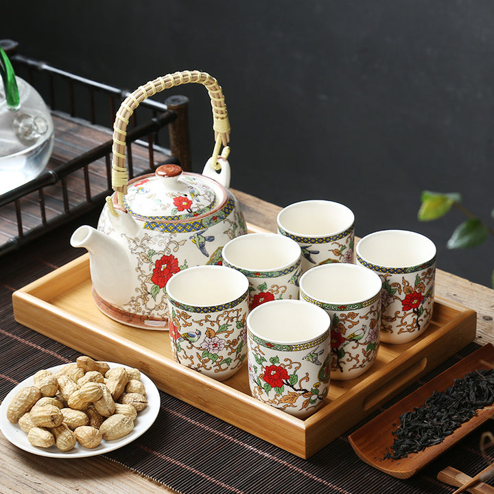 Juego de té, en porcelana con filtro 900ml, tetera con 6 vasitos. (M1)