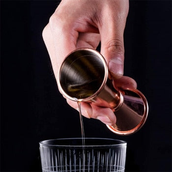 Jigger doble con banda chapada en cobre 1 y 2 oz.